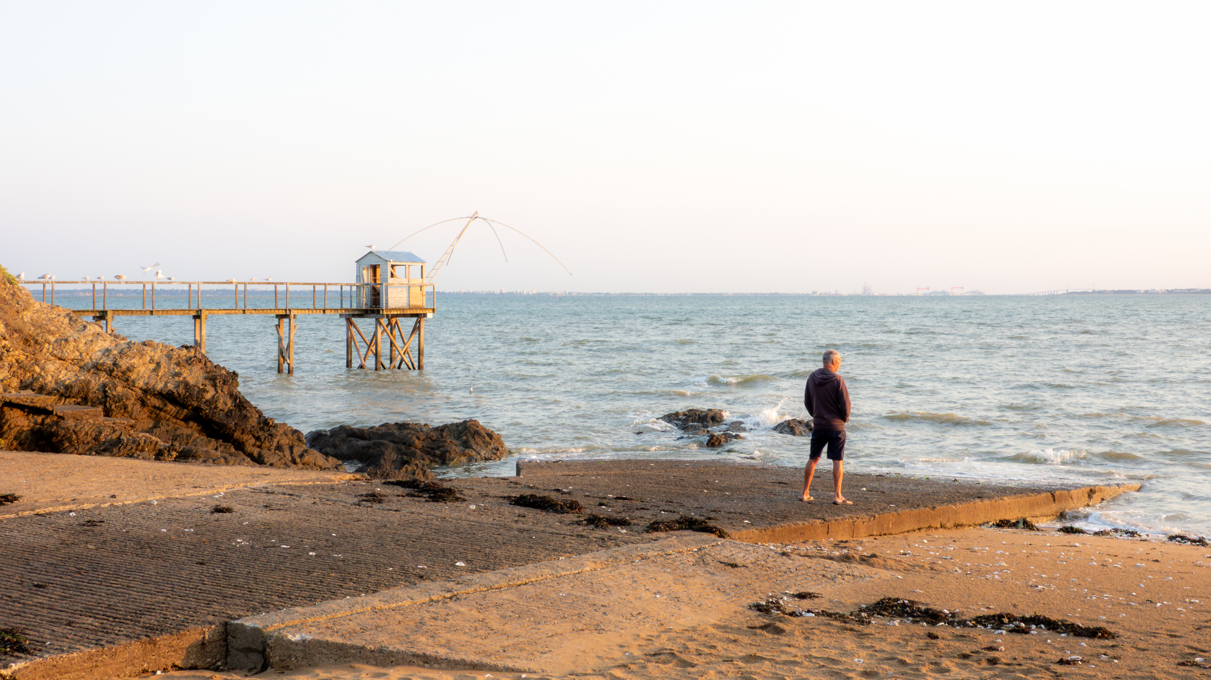 Man Overlooking the Ocean at Port Giraud