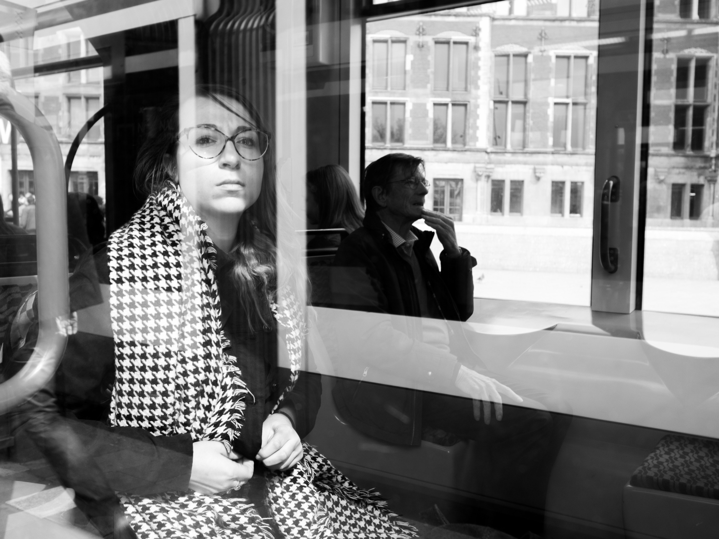 Woman behind a Tram Window