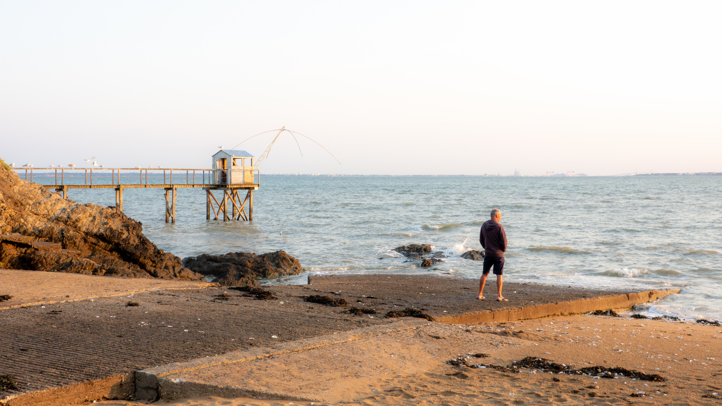 Man Overlooking the Ocean at Port Giraud