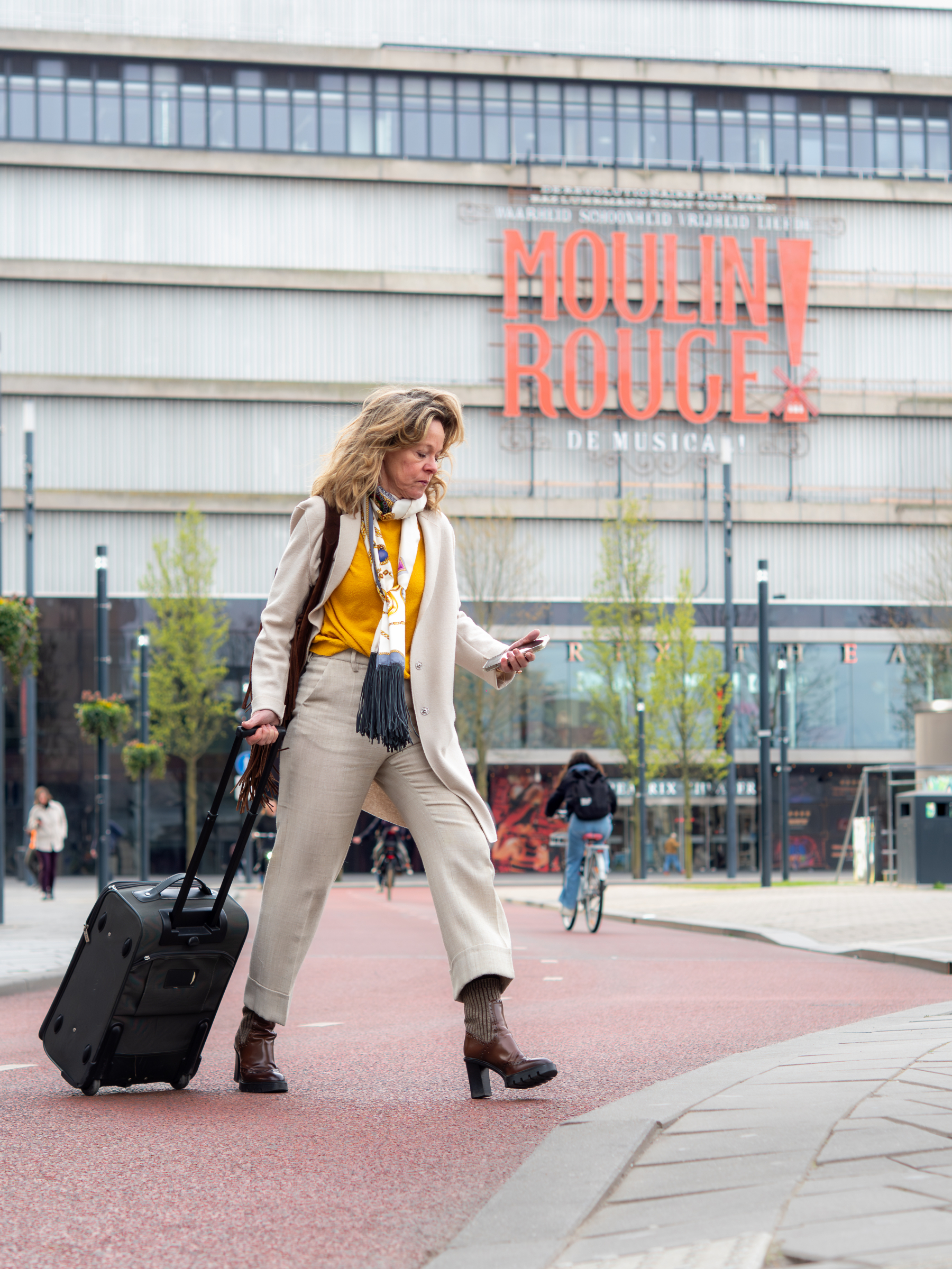 Woman with Luggage Trolley